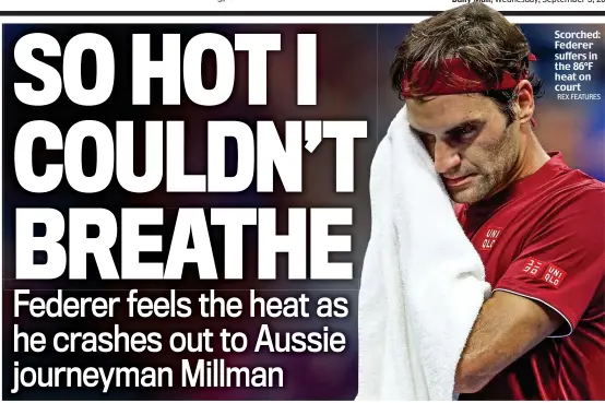  ?? REX FEATURES ?? Scorched: Federer suffers in the 86°F heat on court