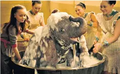  ??  ?? Bathtime: Tim Burton’s live-action remake of Dumbo