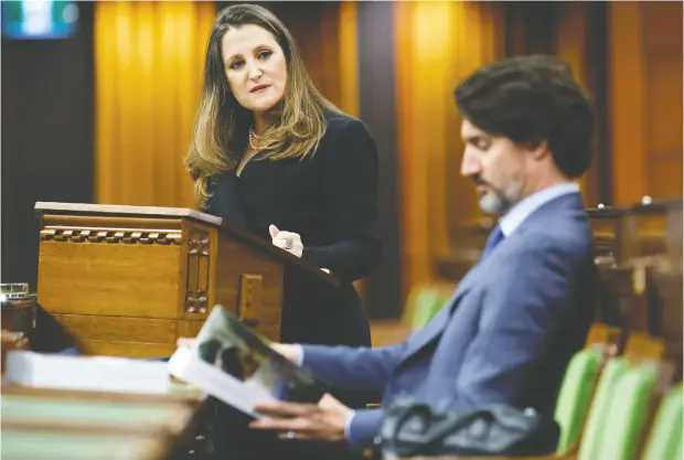  ?? ‘BLAIR GABLE / REUTERS ?? Finance Minister Chrystia Freeland delivers the budget in the near-empty House of Commons.