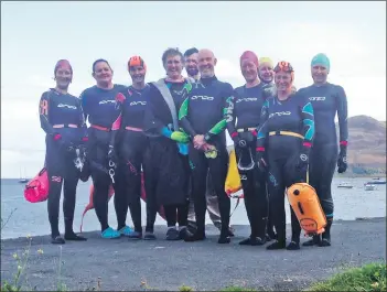  ??  ?? The local splash entrants ahead of their final group training session.