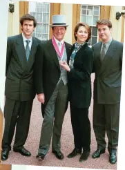  ??  ?? Golden gun: Sir Roger with Maud Adams and Britt Ekland and, above, with his children and CBE in 1999