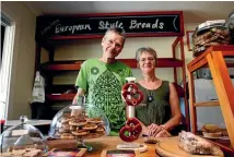  ?? NINA HINDMARSH/NELSON MAIL ?? Rolf and Ute Kleine in their Takaka Infusion bakery. They are suing police over being wrongly targeted in a blackmail investigat­ion.