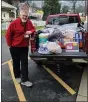  ??  ?? Pastor Gil Vining drops off donations from New Hanover United Methodist Church, Gilbertsvi­lle, for Preston’s Pantry.