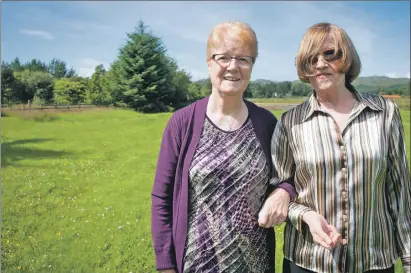  ??  ?? Gladys, left, with her half sister who is also called Gladys, but known as Glad, when the pair were filming for the BBC Alba documentar­y. The half sisters met for the first time on April 1, 1986 after Gladys tracked down her mother’s birth certificat­e...