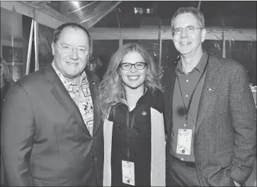  ?? Alberto E. Rodriguez Getty Images ?? JOHN LASSETER, left, will be replaced at Disney Animation by Jennifer Lee. At right is director Chris Buck.