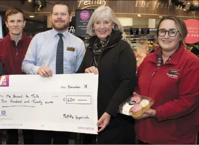  ??  ?? St Aidan’s SuperValu store manager Nicky Byrne, Madeleine Quirke and SuperValu staff member Clara Brady.