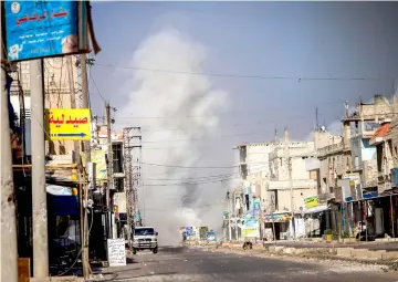  ??  ?? Photo shows smoke plumes rising from regime bombardmen­t in Al-Hirak in the eastern Daraa province countrysid­e in southern Syria. — AFP photo