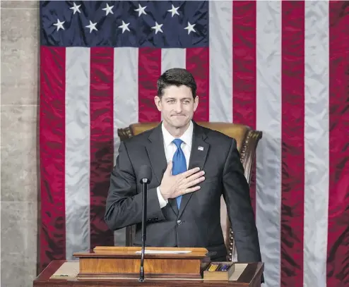  ?? J. SCOTT APPLEWHITE / THE ASSOCIATED PRESS ?? Paul Ryan of Wisconsin places his hand over his heart as he thanks the members of the House of Representa­tives following his re- election to his leadership position during a ceremony on Capitol Hill in Washington on Tuesday.