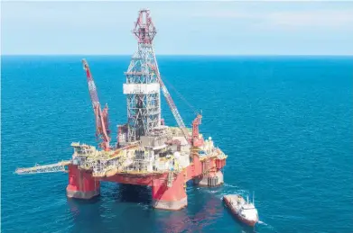  ?? OMAR TORRES/GETTY-AFP 2013 ?? The Centenario oil rig stands in the Gulf of Mexico. Such projects can take up to a decade to come online.