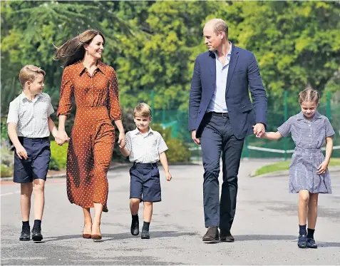  ?? ?? The Duke and Duchess of Cambridge walk Prince George, Prince Louis and Princess Charlotte to their new school, Lambrook, near Ascot, for a ‘settling in’ session