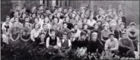  ?? CHRIS LILLSTRUNG — THE NEWS-HERALD ?? One of the homerooms of the Harvey sophomore class is shown in the school’s 1936 yearbook. Lentie Bolden is in the last row, fifth from the left.