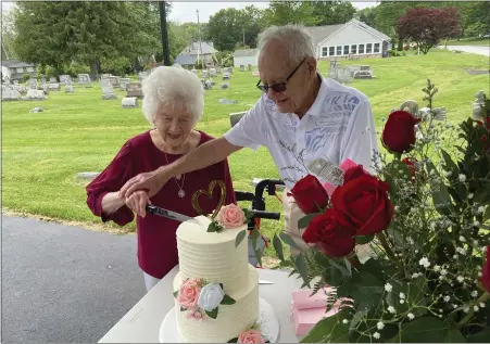  ?? EVAN BRANDT — MEDIANEWS GROUP ?? Martha and Chester Pish, cut a cake from Beverly’s Pastry Shop during a celebratio­n of their 80th wedding anniversar­y, making them the oldest married couple in Pennsylvan­ia.