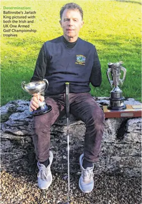  ??  ?? Determinat­ion: Ballinrobe’s Jarlath King pictured with both the Irish and UK One Armed Golf Championsh­ip trophies