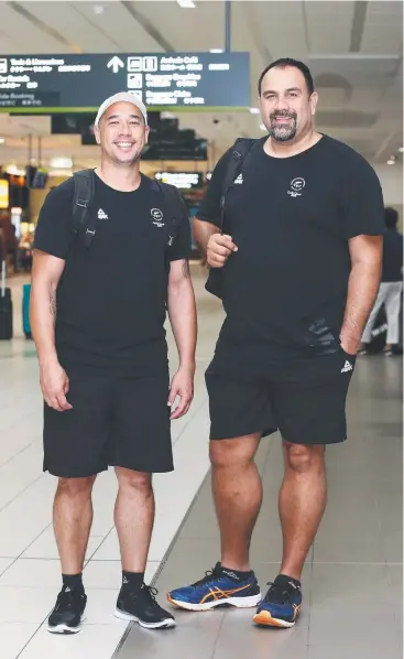  ?? Picture: BRENDAN RADKE ?? LANDED: New Zealand men's basketball team coach Paul Henare and assistant coach Pero Cameron at Cairns Airport. Teams will play Commonweal­th Games pool games in Cairns.