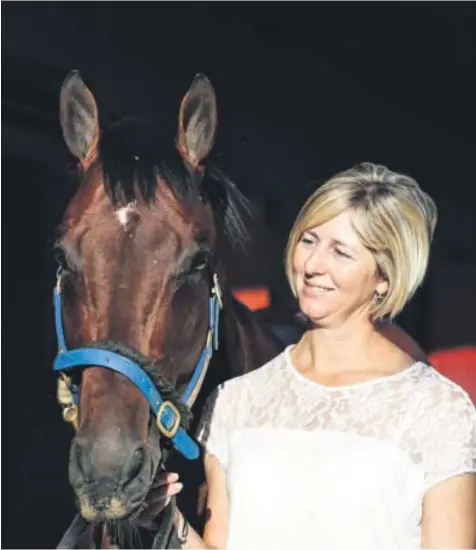  ??  ?? BIG CHANCE. Candice Bass-Robinson with one of her three Sun Met runners, Horizon. She has a strong chance of winning the Cape’s premier race.