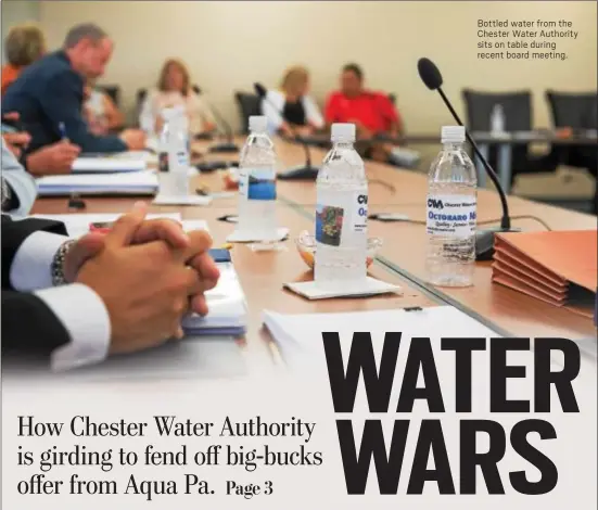  ?? RICK KAUFFMAN – DIGITAL FIRST MEDIA ?? Bottled water from the Chester Water Authority sits on table during recent board meeting.