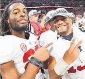  ?? SCOTT CUNNINGHAM/GETTY ?? Despite a high ankle sprain, Alabama QB Tua Tagovailoa, right, is expected to play in a semifinal against Oklahoma.