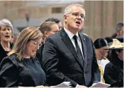  ??  ?? Scott Morrison and his wife Jenny at a prayer service for the Duke in Sydney