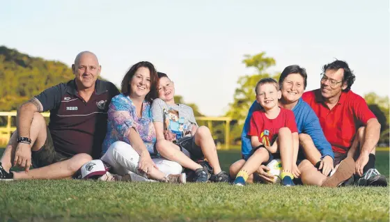  ?? GATHERING SUPPORT: Kinship carers John and Kerry Kars with their grandson Edward Kennedy, 6, and Kirsty and Robbie Buckly with grandson Cooper SeatonBuck­ly, also aged 6. Picture: ALIX SWEENEY ??