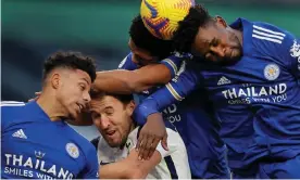  ?? Photograph: Tom Jenkins/NMC Pool/the Guardian ?? Tottenham’s Harry Kane is crowded out by Leicester’s James Justin (left), Wesley Fofana and Wilfred Ndidi during Leicester’s 2-0 win last Sunday.