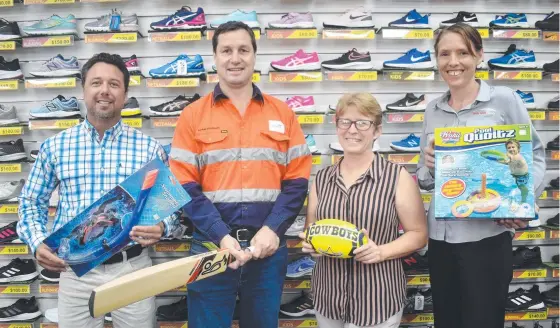  ??  ?? Hinchinbro­ok MP Nick Dametto, Wilmar Sugar regional operations manager Adam Douglas, Hinchinbro­ok Community Support Centre’s Tracey Castles and Hinchinbro­ok Chamber of Commerce, Industry and Tourism president Rachael Coco promote the Shop Local campaign at Sportspowe­r Ingham.