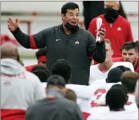  ?? ASSOCIATED PRESS FILE PHOTO ?? Ohio State head coach Ryan Day talks to his team at practice earlier this season. As Alabama, Ohio State, Clemson, Oregon, Notre Dame, Oklahoma and Florida prepared to play for conference championsh­ips, they signed top-10 recruiting classes.