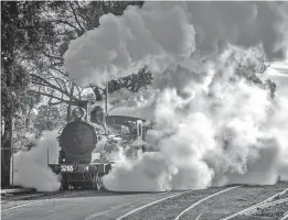  ?? THNSW/STEVE BURROWS ?? Smoke screen: 4-6-0 No. 3265, built by Beyer Peacock of Manchester in 1901, makes its presence felt in the NSW Rail Museum’s shed yard at Thirlmere during the annual Festival of Steam.