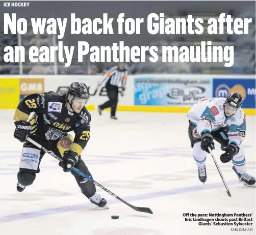  ??  ?? Off the pace: Nottingham Panthers’ Eric Lindhagen shoots past Belfast
Giants’ Sebastien Sylvester