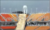  ?? AHN YOUNG-JOON — THE ASSOCIATED PRESS ?? The Pyeongchan­g Olympic Stadium is still under constructi­on in Pyeongchan­g, South Korea, on Nov. 25. Just when South Korea thought it was finally creating a buzz for February’s Winter Olympics, North Korea fires up its most powerful missile yet and...