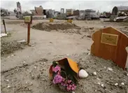  ?? Rafael Yaghobzade­h / Associated Press ?? Yasser Abdallah of Sudan, who died in September trying to reach the U.K., is buried in Calais, France.