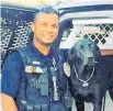  ?? Photo / AP ?? Ronil Singh with his police dog.