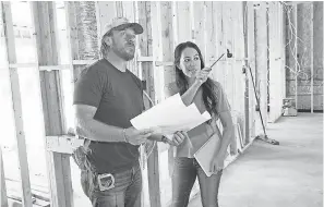  ??  ?? Joanna and Chip Gaines check on the progress of a home on “Fixer Upper.” JEFF JONES/HGTV