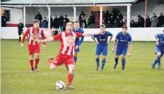  ?? STEVEN JONES ?? Sam Jones scores from the spot for Holywell Town