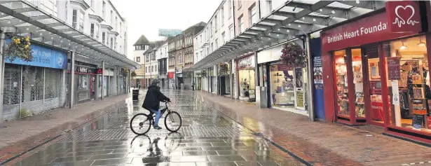  ?? Picture: Adrian White ?? Young women were the most likely to be furloughed as the coronaviru­s pandemic affected businesses in Carmarthen­shire.