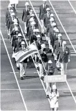  ??  ?? Memories: Ladany competing, right. Above: the Israeli team marches at the opening ceremony of the games