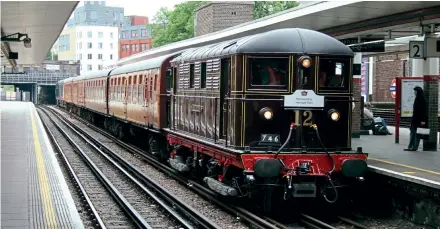  ??  ?? 1923 electric loco No. 12 Sarah Siddons is a popular museum favourite, often used on special trains such as here at Harrow on the Hill on May 20, 2009 with the 4-TC set in tow. Christophe­r Westcott