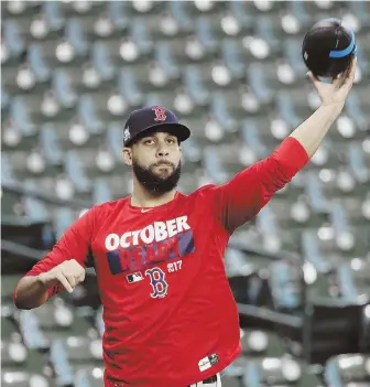  ?? AP PHOTO ?? ROLE PLAYER: Starter-turned-reliever David Price tosses a football around during the Red Sox’ workout yesterday in Houston.