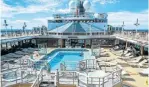  ??  ?? POOL WITH A VIEW: There are two outdoor pools on the Cunard Lines’ Queen Elizabeth