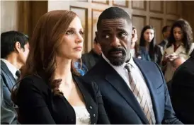  ??  ?? Jessica Chastain and Idris Elba play their hands in Molly’s Game