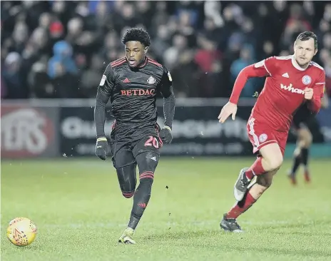  ??  ?? Josh Maja powers forward for Sunderland. Pictures by Frank Reid.