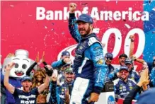  ?? THE ASSOCIATED PRESS ?? Martin Truex Jr. celebrates in victory lane Sunday after winning a NASCAR Cup Series race at Charlotte Motor Speedway in Concord, N.C.