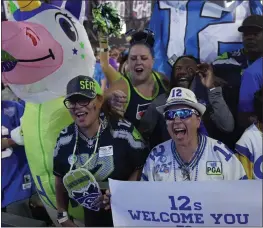  ?? JOHN LOCHER — THE ASSOCIATED PRESS ?? Seahawks fans cheer during the third day of the NFL draft on Saturday in Las Vegas.