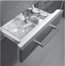  ?? MONOGRAM ?? The easy-access ice maker in Monogram’s 30-inch refrigerat­or drawer, was designed to make scooping ice easy, at counter level, without requiring bending over.