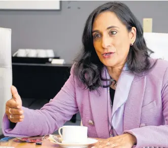  ?? RYAN TAPLIN ?? Kentville native Anita Anand, the new president of the Treasury Board, speaks to The Chronicle
1. Herald during an interview in downtown Halifax on Aug.