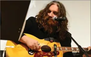  ?? HAMILTON SPECTATORO­R FILE PHOTO ?? Tom Wilson in a tribute to Hamilton blues legend Jackie Wilson performed with other local musicians at the Central Library during Black History month earlier this year.