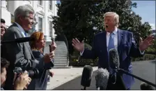  ?? EVAN VUCCI — THE ASSOCIATED PRESS ?? President Donald Trump talks to reporters Friday on the South Lawn of the White House in Washington.