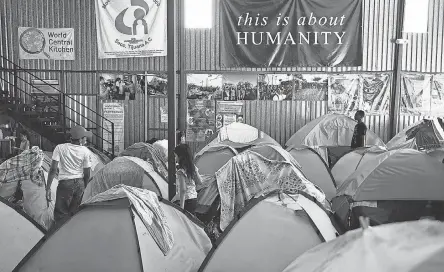  ?? AFP VIA GETTY IMAGES ?? Families live in tents on the border in Mexico as Title 42 and “remain in Mexico” policies continue.