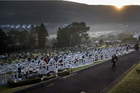  ??  ?? Aberfan cemetery yesterday, on the anniversar­y of a disaster that killed 116 school children (Getty Images)