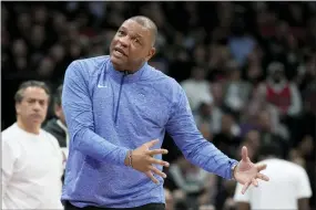  ?? FRANK GUNN — THE CANADIAN PRESS VIA AP ?? Philadelph­ia 76ers coach Doc Rivers argues with officials during the second half of Game 6of the team’s NBA basketball first-round playoff series against the Toronto Raptors on Thursday, April 28, 2022, in Toronto.