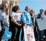  ??  ?? Students cheer during an Oklahoma Education Associatio­n rally outside the state Capitol on Wednesday, the third day of a walkout by Oklahoma teachers. The union rally followed one led by students.